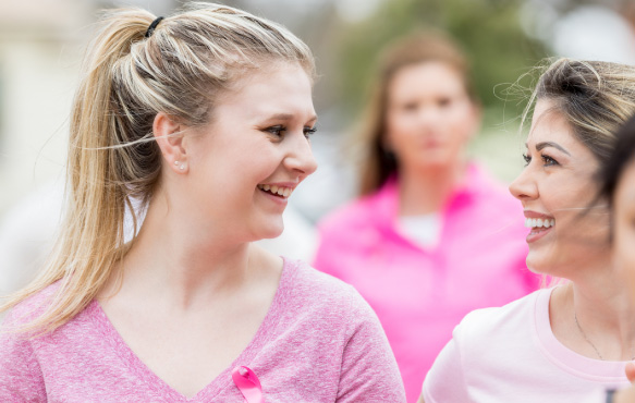 Two women outdoors smiling